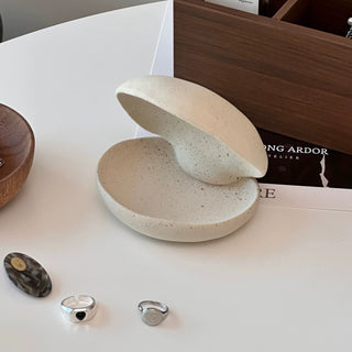 Shell motif natural ceramic accessory tray   perfect for holding small items plates or trays.