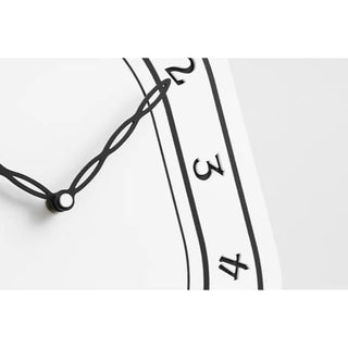Oval-shaped acrylic white wall clock