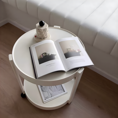 Two-tiered round side table with castersin .
