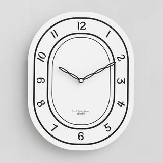 Oval-shaped acrylic white wall clock