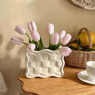 Biscuit motif flower vase.