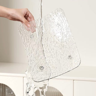Wavy pattern large tray with legsin  for storage.