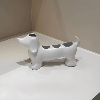 Dachshund motif ceramic toothbrush holder dog-themed storage bathroom sink.