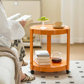 Two-tiered round side table with castersin .