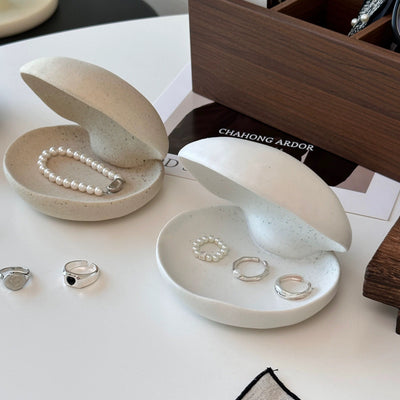 Shell motif natural ceramic accessory tray   perfect for holding small items plates or trays.