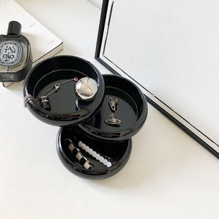 Sliding tier accessory trayin  storage.