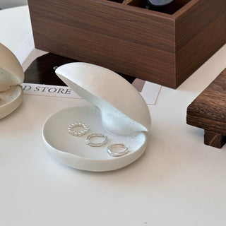 Shell motif natural ceramic accessory tray   perfect for holding small items plates or trays.