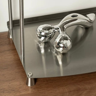 Stainless steel silver storage two-tier display rack for cosmetics and perfumes.