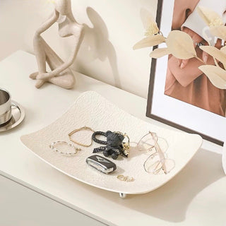 Wavy pattern large tray with legsin  for storage.