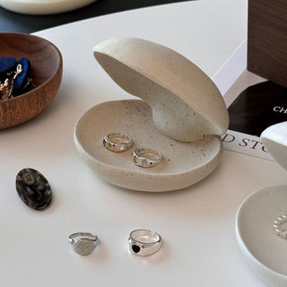 Shell motif natural ceramic accessory tray   perfect for holding small items plates or trays.