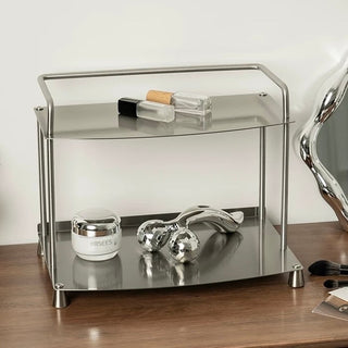 Stainless steel silver storage two-tier display rack for cosmetics and perfumes.