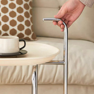 Silver frame with casters two-tier side tablein  wagon.