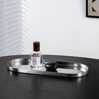 Stainless steel silver oval-shaped simple accessory trayin 3 sizes for storage.