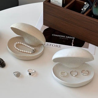 Shell motif natural ceramic accessory tray   perfect for holding small items plates or trays.
