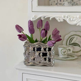 Biscuit motif flower vase.