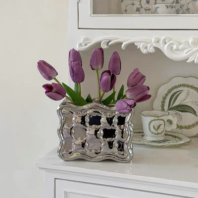 Biscuit motif flower vase.