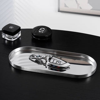 Stainless steel silver oval-shaped simple accessory trayin 3 sizes for storage.