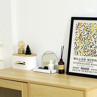 Arched storage tray with mirrorin  for storing small items.