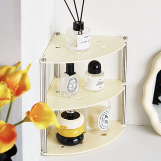 Cheese-themed perforated three-tiered corner rack   Cosmetic storage