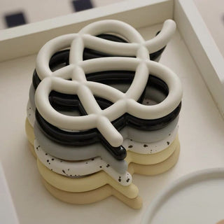 Knot Design Ceramic Trivet    Object