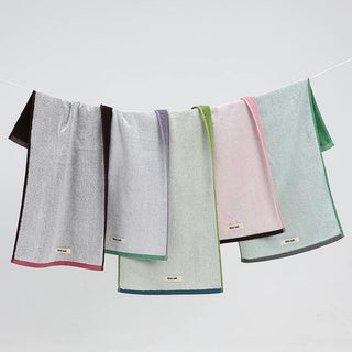 Two-tone solid color face towel 100% cotton combed cotton absorbent.