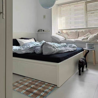 Brown and blue checkered door mat 50x80cm absorbent non-slip tufted.