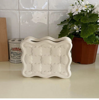 Biscuit motif flower vase.