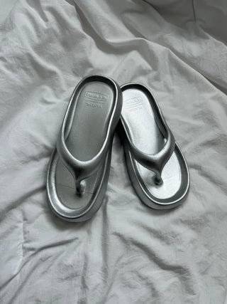 Soft and fluffy summer silver flip-flops