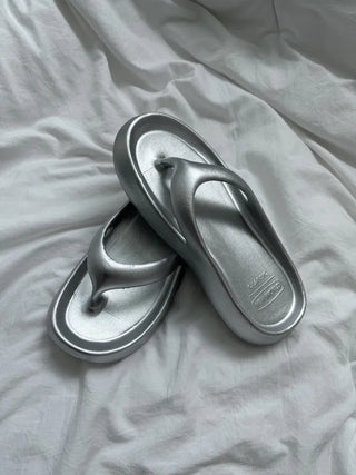 Soft and fluffy summer silver flip-flops