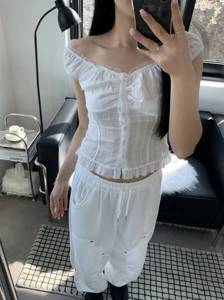 Off-shoulder frill sleeveless blouse