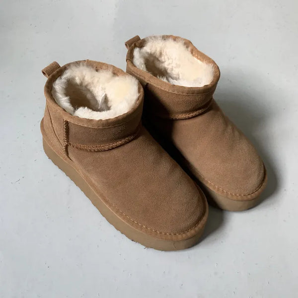 Natural cowhide mini platform short UGG boots