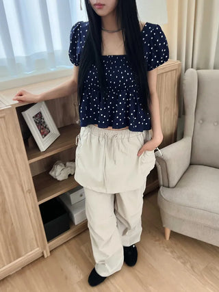 Navy dotted frill puff blouse