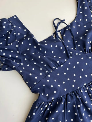 Navy dotted frill puff blouse