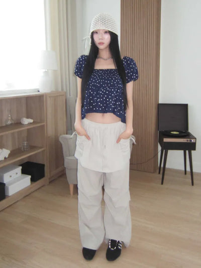 Navy dotted frill puff blouse