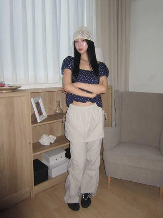 Navy dotted frill puff blouse