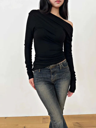 Curved low-rise slim bootcut denim pants