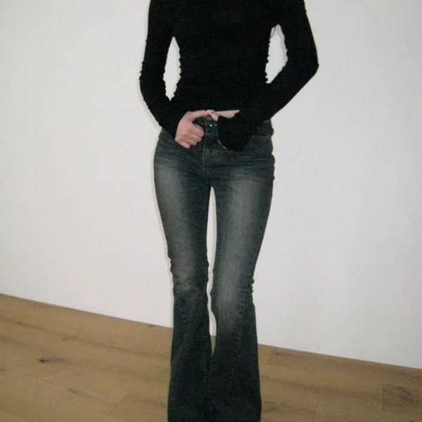 Curved low-rise slim bootcut denim pants