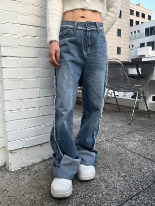 Unbalanced overlock stitch light blue wide denim pants