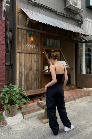 Backless ribbed sleeveless top with built-in cap
