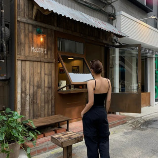 Backless ribbed sleeveless top with built-in cap