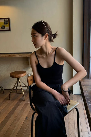 Backless ribbed sleeveless top with built-in cap