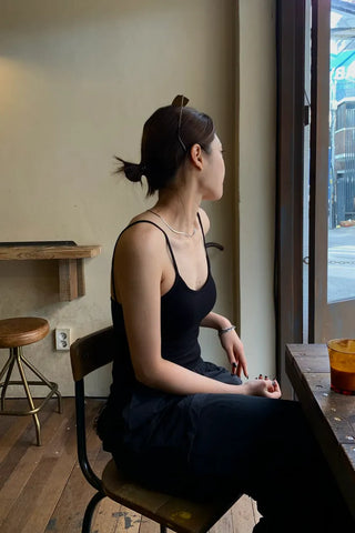 Backless ribbed sleeveless top with built-in cap