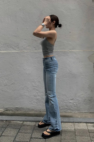 Sleeveless top with built-in cap
