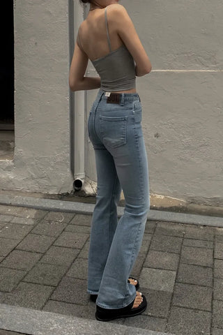 Sleeveless top with built-in cap