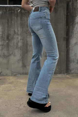 Sleeveless top with built-in cap