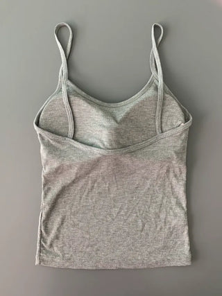 Sleeveless top with built-in cap