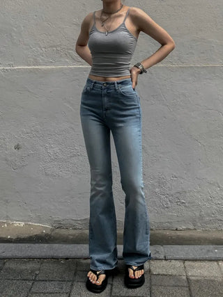 Sleeveless top with built-in cap
