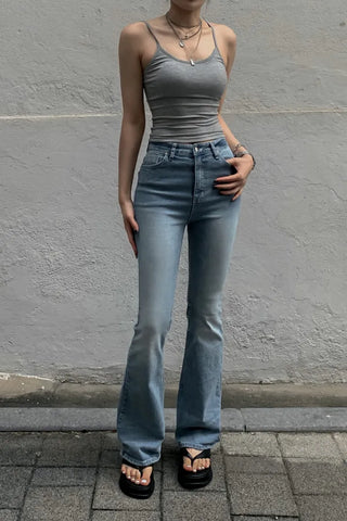 Sleeveless top with built-in cap