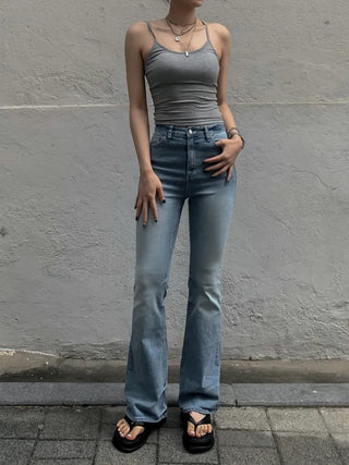 Sleeveless top with built-in cap