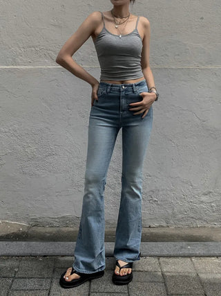 Sleeveless top with built-in cap